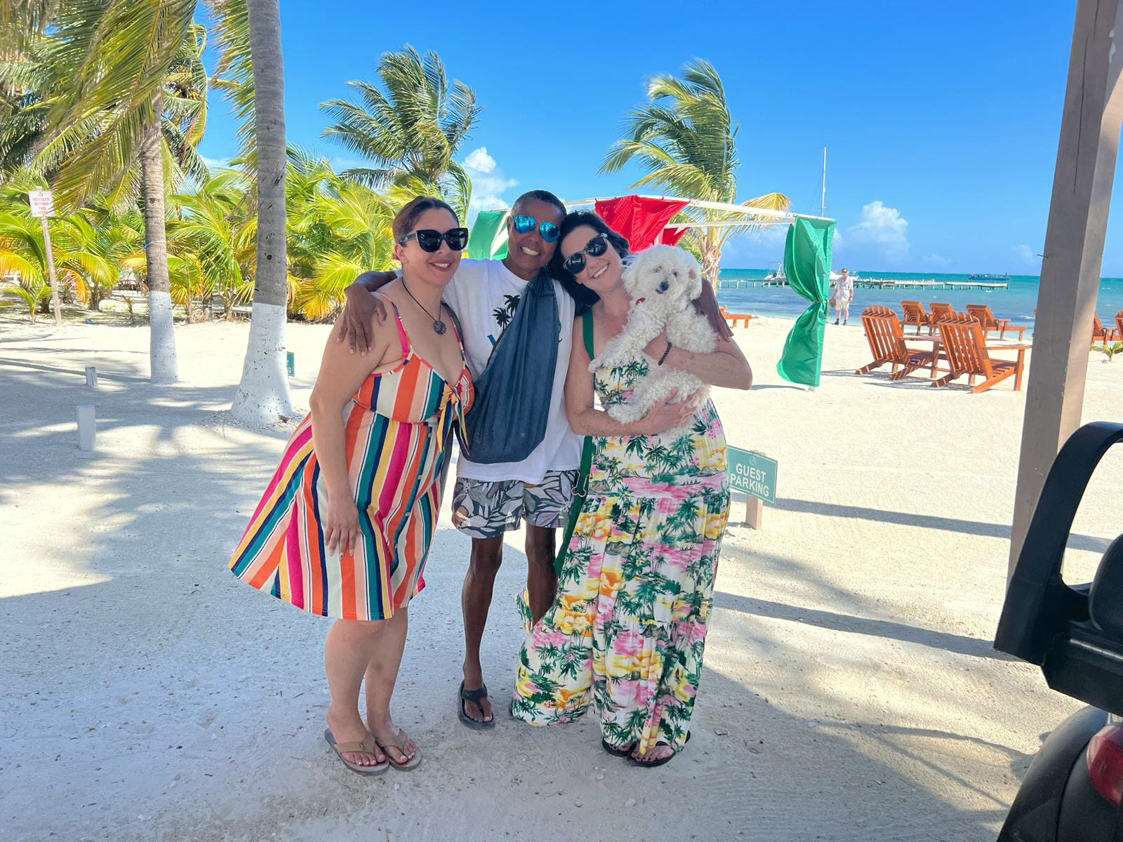 Guests on the beach in front of the property